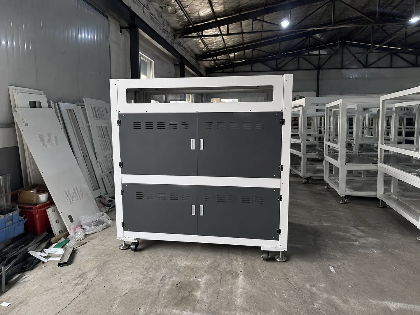 Illustrative configuration of a machine equipment enclosure in a factory setting